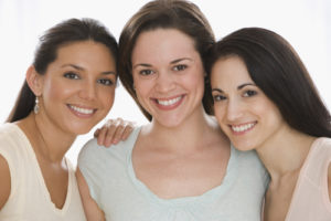three women with different skin types and beautiful skin
